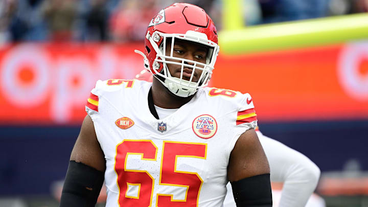 Dec 17, 2023; Foxborough, Massachusetts, USA; Kansas City Chiefs guard Trey Smith (65) warms up before a game against the New England Patriots at Gillette Stadium. Mandatory Credit: Eric Canha-Imagn Images