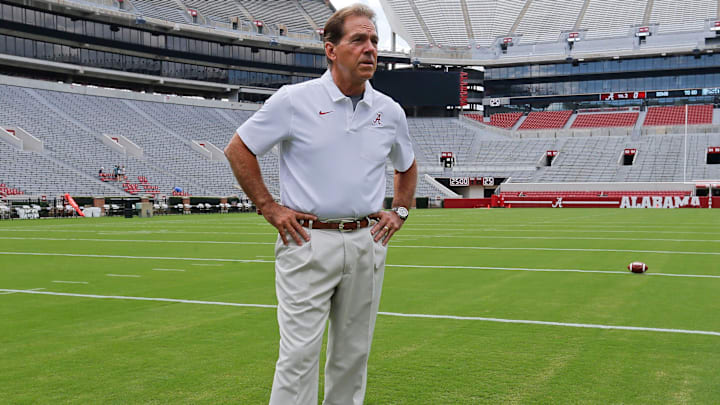 Alabama football coach Nick Saban stands on the turf inside Bryant-Denny Stadium during his team's media day in 2019. Alabama football coach Nick Saban stands on the turf inside Bryant-Denny Stadium during his team's media day in 2019.