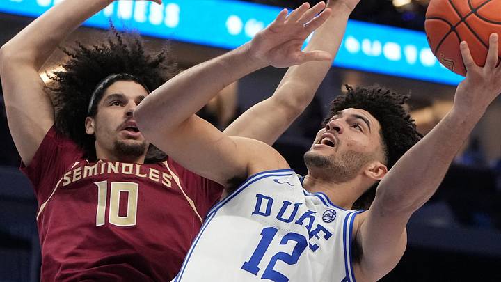 Mar 12, 2026; Charlotte, NC, USA; Duke Blue Devils forward Cameron Boozer (12) shoots as Florida State Seminoles guard Lajae Jones (10) defends in the second half at Spectrum Center. Mandatory Credit: Bob Donnan-Imagn Images Mar 12, 2026; Charlotte, NC, USA; Duke Blue Devils forward Cameron Boozer (12) shoots as Florida State Seminoles guard Lajae Jones (10) defends in the second half at Spectrum Center. Mandatory Credit: Bob Donnan-Imagn Images