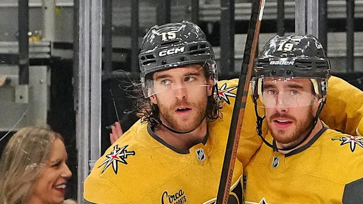 Jan 8, 2026; Las Vegas, Nevada, USA; Vegas Golden Knights right wing Reilly Smith (19) celebrates with defenseman Noah Hanifin (15) after scoring a goal against the Columbus Blue Jackets during the second period at T-Mobile Arena. Mandatory Credit: Stephen R. Sylvanie-Imagn Images