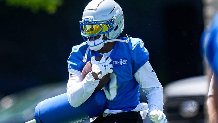 Detroit Lions running back Jahmyr Gibbs (0) practices a drill during OTAs at team's Allen Park Performance Center