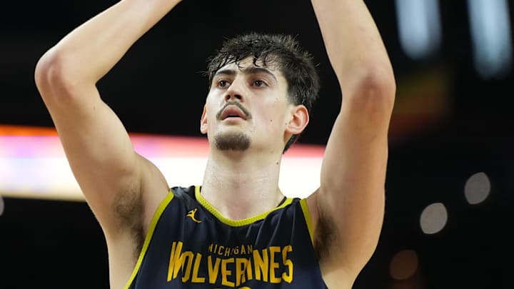 Apr 3, 2026; Indianapolis, IN, USA; Michigan Wolverines center Aday Mara (15) shoots the ball during a practice session ahead of the Final Four of the men's 2026 NCAA Tournament at Lucas Oil Stadium. Mandatory Credit: Bob Donnan-Imagn Images