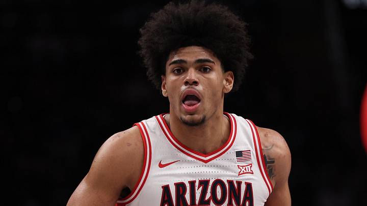 Mar 14, 2026; Kansas City, MO, USA; Arizona Wildcats forward Koa Peat (10) dribbles downcourt during the first half against the Houston Cougars during the men's Big 12 Conference Tournament Championship at T-Mobile Center. Mandatory Credit: William Purnell-Imagn Images
