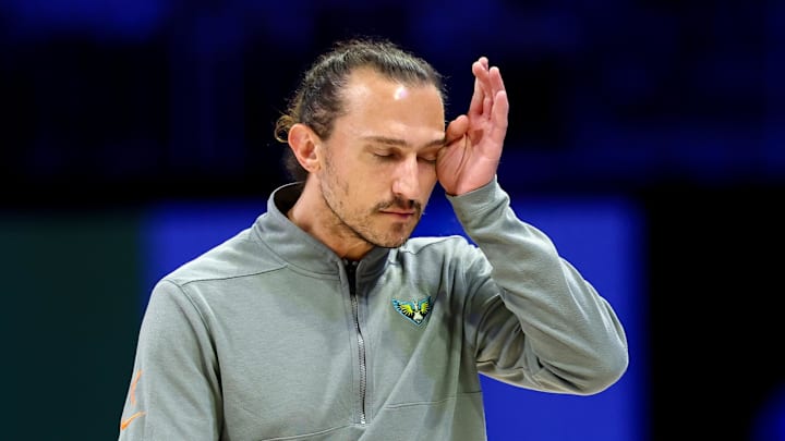 Aug 24, 2025; Arlington, Texas, USA;  Dallas Wings head coach Chris Koclanes reacts after receiving a technical foul during the second half against the Golden State Valkyries at College Park Center. Mandatory Credit: Kevin Jairaj-Imagn Images