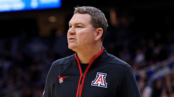 Mar 27, 2025; Newark, NJ, USA; Arizona Wildcats head coach Tommy Lloyd during the first half against the Duke Blue Devils during an East Regional semifinal of the 2025 NCAA tournament at Prudential Center. Mandatory Credit: Vincent Carchietta-Imagn Images Mar 27, 2025; Newark, NJ, USA; Arizona Wildcats head coach Tommy Lloyd during the first half against the Duke Blue Devils during an East Regional semifinal of the 2025 NCAA tournament at Prudential Center. Mandatory Credit: Vincent Carchietta-Imagn Images