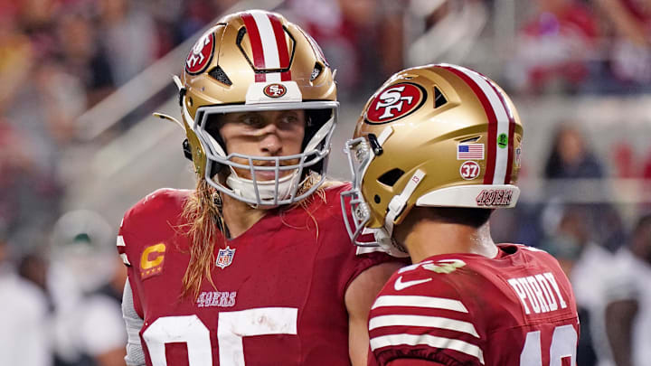 Sep 9, 2024; Santa Clara, California, USA; San Francisco 49ers tight end George Kittle (85) chats with San Francisco 49ers quarterback Brock Purdy (13) while facing the New York Jets in the fourth quarter at Levi's Stadium. Mandatory Credit: David Gonzales-Imagn Images