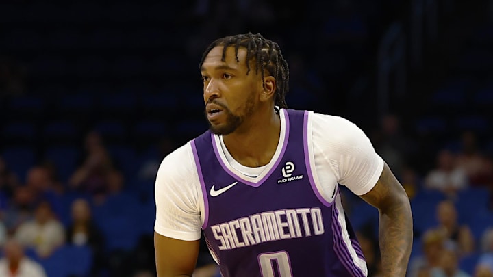 Mar 26, 2026; Orlando, Florida, USA;  Sacramento Kings guard Malik Monk (0) looks to pass in the first half against the Orlando Magic at Kia Center. Mandatory Credit: Russell Lansford-Imagn Images