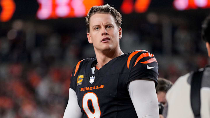 Cincinnati Bengals quarterback Joe Burrow (9) celebrates after the game-winning touchdown pass to Tee Higgins in overtime of the NFL Week 17 game between the Cincinnati Bengals and the Denver Broncos at Paycor Stadium in downtown Cincinnati on Saturday, Dec. 28, 2024. The Bengals took a 30-24 win in overtime to remain in the post season chase.