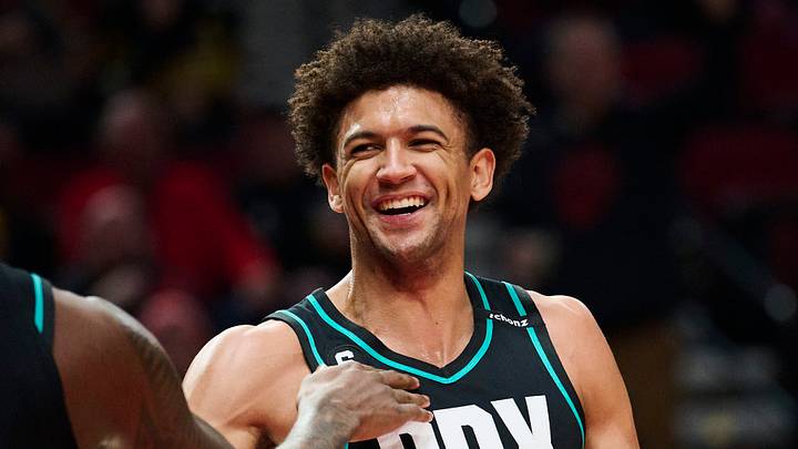 Feb 13, 2023; Portland, Oregon, USA;  Portland Trail Blazers forward Matisse Thybulle (4) smiles during the first half with forward Nassir Little (10) after blocking a shot against the Los Angeles Lakers at Moda Center. Mandatory Credit: Troy Wayrynen-USA TODAY Sports