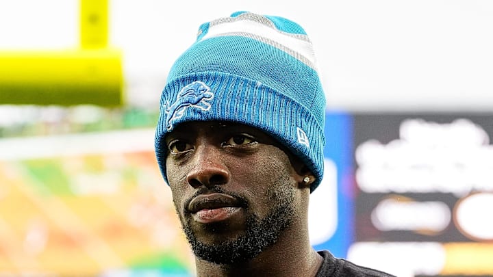 Detroit Lions cornerback Terrion Arnold walks off the field during warmups before the Green Bay Packers game at Lambeau Field in Green Bay, Wis. on Sunday, Nov. 3, 2024. He was wearing a T-shirt in support of injured teammate Aidan Hutchinson.