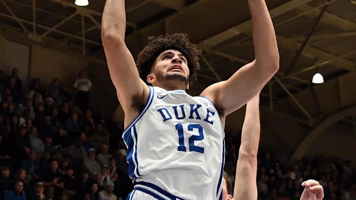 Dec 16, 2025; Durham, North Carolina, USA; Duke Blue Devils forward Cameron Boozer (12) shoots in front of Lipscomb Bisons center Charlie Williams (33) during the second half at Cameron Indoor Stadium. The Blue Devils won 97-73. Mandatory Credit: Rob Kinnan-Imagn Images Dec 16, 2025; Durham, North Carolina, USA; Duke Blue Devils forward Cameron Boozer (12) shoots in front of Lipscomb Bisons center Charlie Williams (33) during the second half at Cameron Indoor Stadium. The Blue Devils won 97-73. Mandatory Credit: Rob Kinnan-Imagn Images