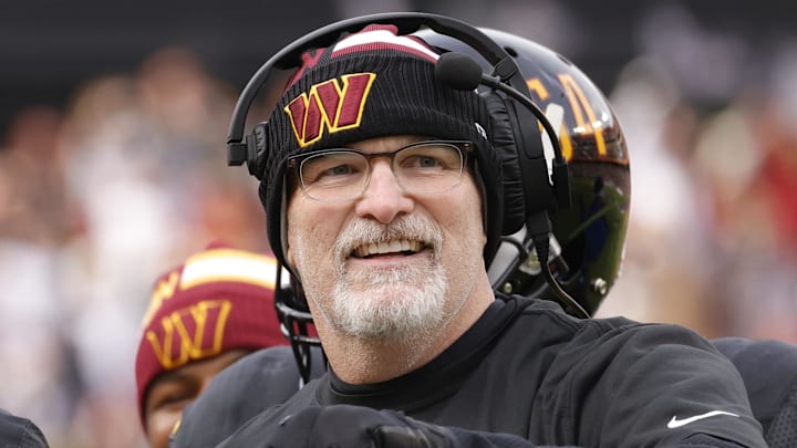Dec 1, 2024; Landover, Maryland, USA; Washington Commanders head coach Dan Quinn (right) celebrates with Commanders running back Brian Robinson Jr. (8) after scoring a touchdown against the Tennessee Titans during the first half at Northwest Stadium. Mandatory Credit: Amber Searls-Imagn Images