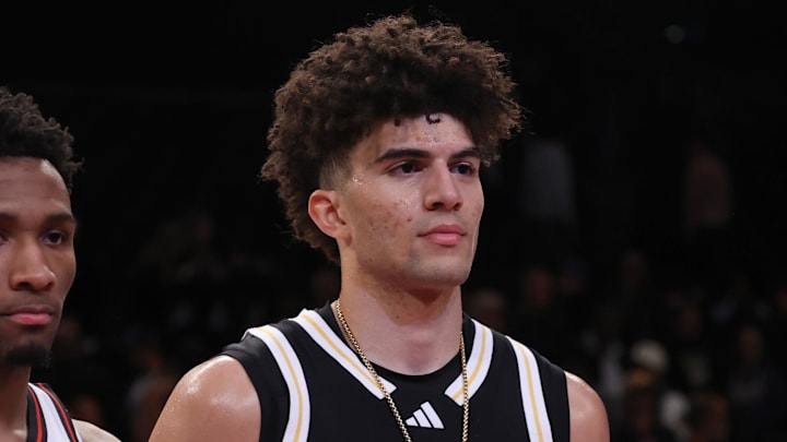 Apr 1, 2025; Brooklyn, NY, USA; McDonald's All American West guard Darryn Peterson (22) and McDonald's All American East forward Cameron Boozer (12) pose for photos after the game at Barclays Center. Mandatory Credit: Pamela Smith-Imagn Images Apr 1, 2025; Brooklyn, NY, USA; McDonald's All American West guard Darryn Peterson (22) and McDonald's All American East forward Cameron Boozer (12) pose for photos after the game at Barclays Center. Mandatory Credit: Pamela Smith-Imagn Images