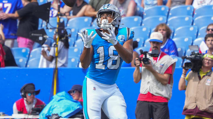 Aug 24, 2024; Orchard Park, New York, USA; Carolina Panthers wide receiver Jalen Coker (18) makes a catch for a touchdown against the Buffalo Bills during the second half at Highmark Stadium. Mandatory Credit: Gregory Fisher-Imagn Images