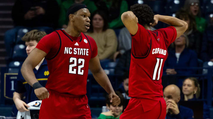 Feb 28, 2026; South Bend, Indiana, USA; NC State Wolfpack forward Ven-Allen Lubin (22) and NC State Wolfpack guard Quadir Copeland (11) celebrate during the first half at Purcell Pavilion at the Joyce Center. Mandatory Credit: Michael Caterina-Imagn Images