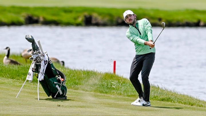 Michigan State's Ashton McCulloch hits his approach shot on hole No. 18 during the NCAA golf regional on Wednesday, May 17, 2023, at Eagle Eye Golf Club in Bath Township.