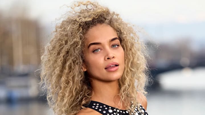 Jasmine Sanders was photographed by Derek Kettela in Zurich, Switzerland. Top and swimsuit by Jaded London. 