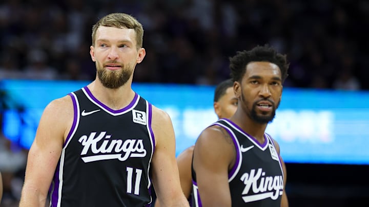 Oct 24, 2024; Sacramento, California, USA; Sacramento Kings forward Domantas Sabonis (11) and guard Malik Monk (0) walk up the court against the Minnesota Timberwolves during the fourth quarter at Golden 1 Center. Mandatory Credit: Sergio Estrada-Imagn Images