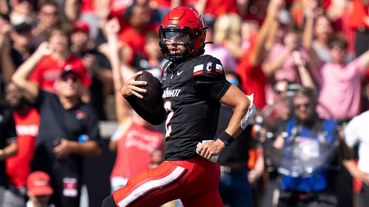 Cincinnati Bearcats quarterback Brendan Sorsby (2) scores a touchdown in the second quarter of the NCAA football game between the Cincinnati Bearcats and Iowa State Cyclones at Nippert Stadium in Cincinnati on Oct. 4, 2025. Cincinnati Bearcats quarterback Brendan Sorsby (2) scores a touchdown in the second quarter of the NCAA football game between the Cincinnati Bearcats and Iowa State Cyclones at Nippert Stadium in Cincinnati on Oct. 4, 2025.