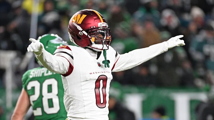 Jan 4, 2026; Philadelphia, Pennsylvania, USA;  Washington Commanders cornerback Mike Sainristil (0) celebrates after Philadelphia Eagles failed on a 4th down conversion during the fourth quarter at Lincoln Financial Field. Mandatory Credit: Eric Hartline-Imagn Images