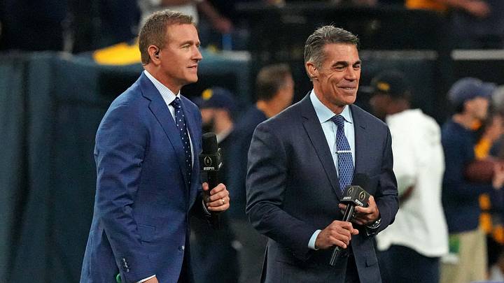 Jan 8, 2024; Houston, TX, USA; ESPN analyst  Kirk Herbstreit walks his dog Ben with ESPN host Chris Fowler before the 2024 College Football Playoff national championship game between the Michigan Wolverines and the Washington Huskies at NRG Stadium. Mandatory Credit: Kirby Lee-USA TODAY Sports