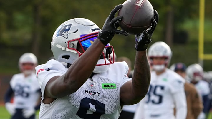 New England Patriots wide receiver Kayshon Boutte (9) catches the ball during practice at the Harrow School.