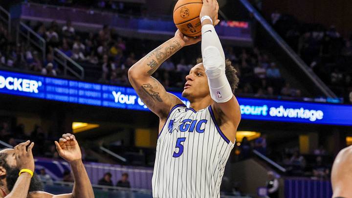 Oct 13, 2026; Orlando, Florida, USA; Orlando Magic forward Paolo Banchero (5) shoots against Cleveland Cavaliers guard James Harden (1) during the second quarter at Kia Center. Mandatory Credit: Mike Watters-Imagn Images Oct 13, 2026; Orlando, Florida, USA; Orlando Magic forward Paolo Banchero (5) shoots against Cleveland Cavaliers guard James Harden (1) during the second quarter at Kia Center. Mandatory Credit: Mike Watters-Imagn Images