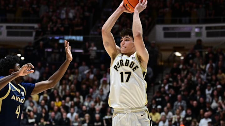 Purdue Boilermakers guard Omer Mayer (17) passes the ball