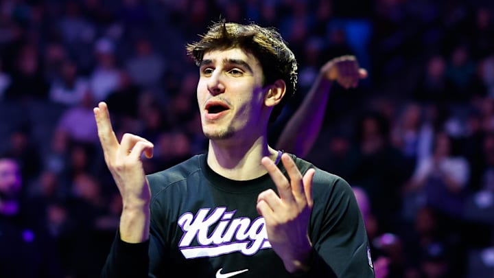 Jan 20, 2026; Sacramento, California, USA; Sacramento Kings center Maxime Raynaud (42) is greeted by teammates during player introductions before the game against the Miami Heat at Golden 1 Center. Mandatory Credit: Sergio Estrada-Imagn Images