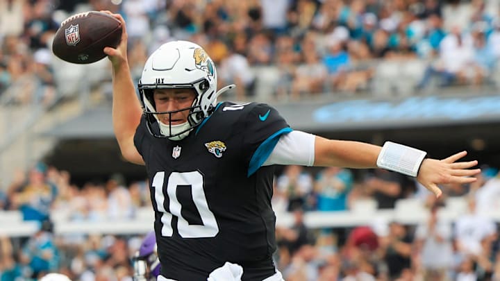 Jacksonville Jaguars quarterback Mac Jones (10) spikes the ball after scoring a touchdown during the first quarter of an NFL football matchup Sunday, Nov. 10, 2024 at Everbank Stadium in Jacksonville, Fla. [Corey Perrine/Florida Times-Union]