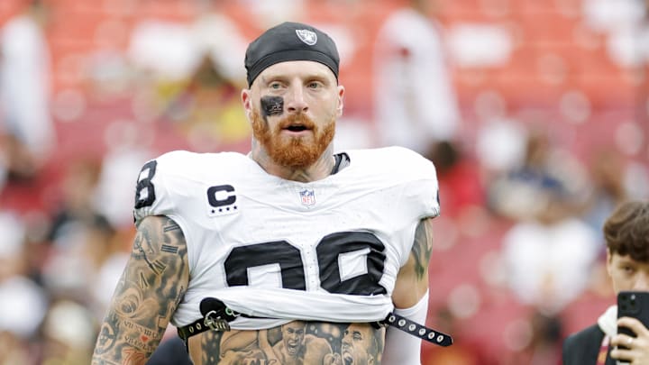 Sep 21, 2025; Landover, Maryland, USA; Las Vegas Raiders defensive end Maxx Crosby (98) warms up before the game against the Washington Commanders at Northwest Stadium. Mandatory Credit: Amber Searls-Imagn Images