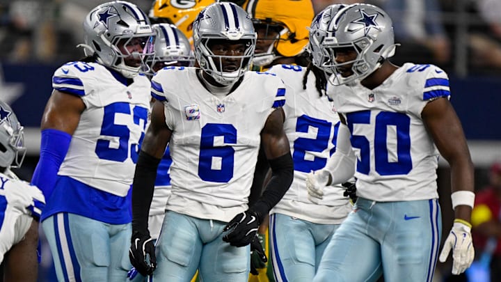 Sep 28, 2025; Arlington, Texas, USA; Dallas Cowboys defensive end James Houston (53), safety Donovan Wilson (6), and linebacker Shemar James (50) celebrate during the game between the Dallas Cowboys and the Green Bay Packers at AT&T Stadium.