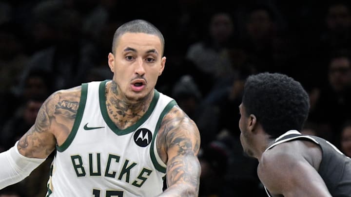 Milwaukee Bucks forward Kyle Kuzma dribbles the ball defended by Brooklyn Nets guard/forward Drake Powell. Milwaukee Bucks forward Kyle Kuzma dribbles the ball defended by Brooklyn Nets guard/forward Drake Powell.