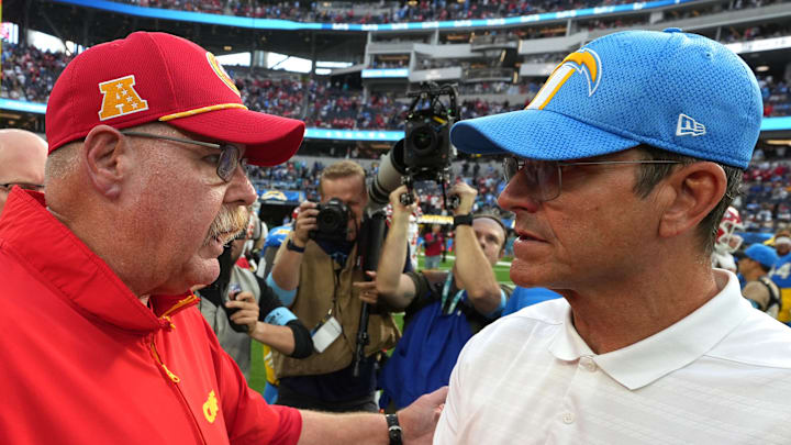 Sep 29, 2024; Inglewood, California, USA; Kansas City Chiefs coach Andy Reid shakes hands with Los Angeles Chargers coach Jim Harbaugh after the game at SoFi Stadium. Mandatory Credit: Kirby Lee-Imagn Images
