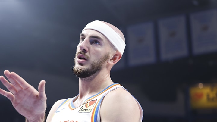 Nov 20, 2024; Oklahoma City, Oklahoma, USA; Oklahoma City Thunder guard Alex Caruso (9) reacts after a play against the Portland Trail Blazers during the second quarter at Paycom Center. Mandatory Credit: Alonzo Adams-Imagn Images
