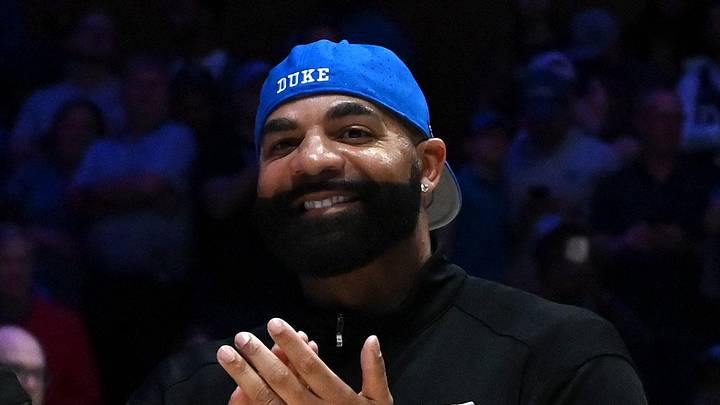Jan 10, 2026; Durham, North Carolina, USA; Former Duke Blue Devils players Shane Battier (left) and Carlos Boozer react to being honored during halftime at Cameron Indoor Stadium. Mandatory Credit: Rob Kinnan-Imagn Images Jan 10, 2026; Durham, North Carolina, USA; Former Duke Blue Devils players Shane Battier (left) and Carlos Boozer react to being honored during halftime at Cameron Indoor Stadium. Mandatory Credit: Rob Kinnan-Imagn Images