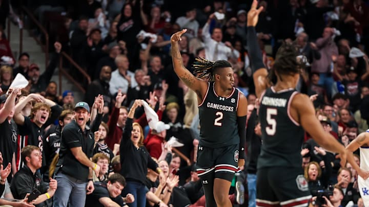Jan 23, 2024; Columbia, South Carolina, USA; South Carolina Gamecocks forward B.J. Mack (2) celebrates making a three point basket against the Kentucky Wildcats in the second half at Colonial Life Arena. Mandatory Credit: Jeff Blake-Imagn Images Jan 23, 2024; Columbia, South Carolina, USA; South Carolina Gamecocks forward B.J. Mack (2) celebrates making a three point basket against the Kentucky Wildcats in the second half at Colonial Life Arena. Mandatory Credit: Jeff Blake-Imagn Images