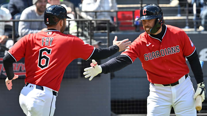 Apr 8, 2026; Cleveland, Ohio, USA; Cleveland Guardians designated hitter David Fry (6) celebrates with first baseman Rhys Hoskins (8) after scoring during the first inning against the Kansas City Royals at Progressive Field. Mandatory Credit: Ken Blaze-Imagn Images