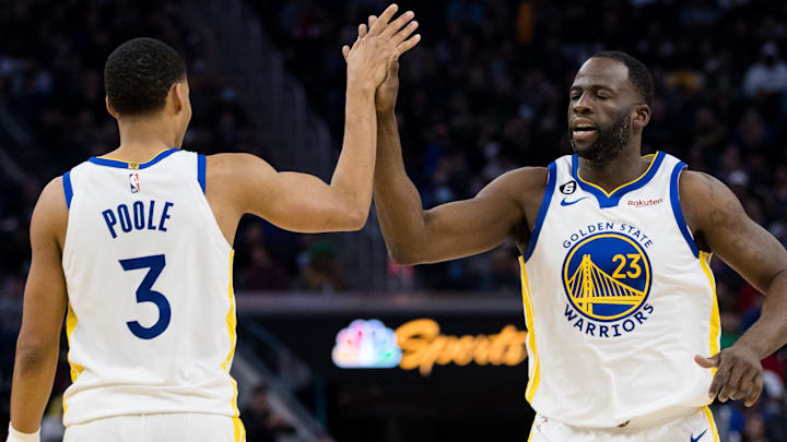 Jan 22, 2023; San Francisco, California, USA; Golden State Warriors guard Jordan Poole (3) and forward Draymond Green (23) celebrate after Poole drew a foul against the Brooklyn Nets during the first half at Chase Center. Mandatory Credit: John Hefti-Imagn Images