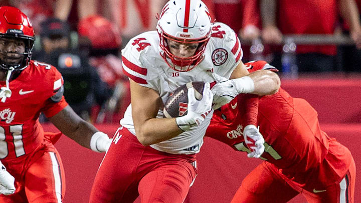 Nebraska tight end Luke Lindenmeyer gains yards in the season opener against Cincinnati.