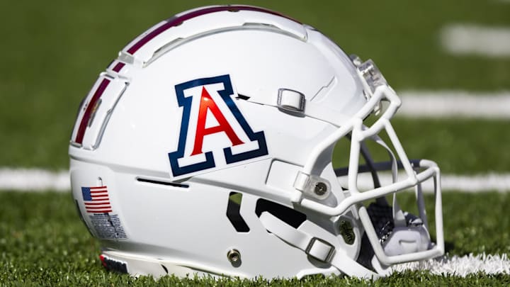 Nov 25, 2022; Tucson, Arizona, USA; Detailed view of an Arizona Wildcats helmet on the field during the Territorial Cup at Arizona Stadium.