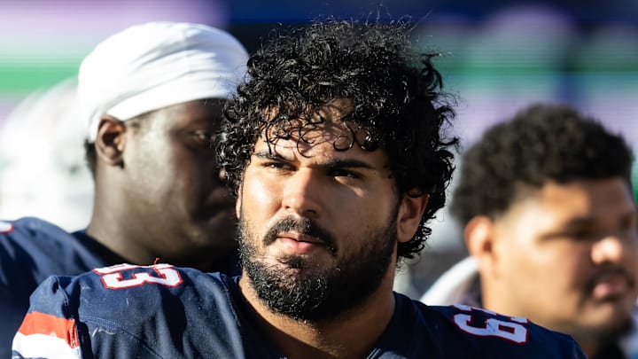 Nov 8, 2025; Tucson, Arizona, USA; Arizona Wildcats offensive lineman Alexander Doost (63) against the Kansas Jayhawks at Arizona Stadium. Mandatory Credit: Mark J. Rebilas-Imagn Images Nov 8, 2025; Tucson, Arizona, USA; Arizona Wildcats offensive lineman Alexander Doost (63) against the Kansas Jayhawks at Arizona Stadium. Mandatory Credit: Mark J. Rebilas-Imagn Images