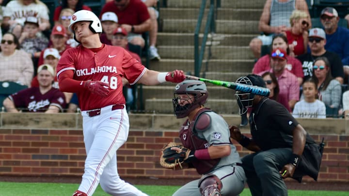 Oklahoma infielder Deiten Lachance swings against Texas A&M. Oklahoma infielder Deiten Lachance swings against Texas A&M.