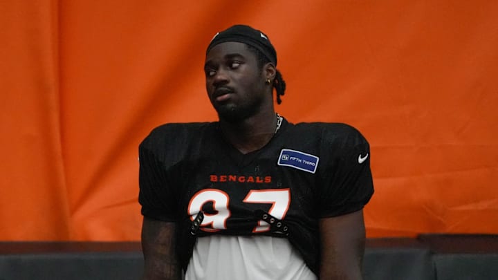 Bengals continue training camp Monday July 28, 2025. Players and coaches ran drills outside on the practice lawn until rain moved the camp to the Bengals' inside practice facility. Bengals Shemar Stewart (97) at camp.