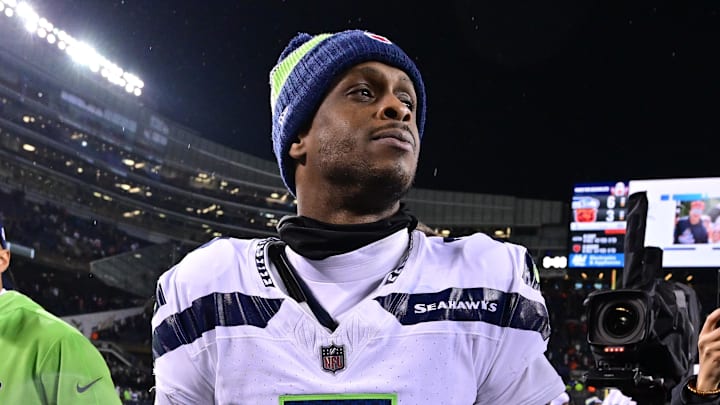 Dec 26, 2024; Chicago, Illinois, USA; Seattle Seahawks quarterback Geno Smith (7) walks off the field after the game against the Chicago Bears at Soldier Field. Mandatory Credit: Daniel Bartel-Imagn Images