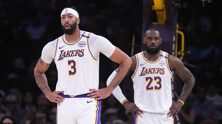 Dec 15, 2024; Los Angeles, California, USA; Los Angeles Lakers forward Anthony Davis (3) and forward LeBron James (23) react in the first half against the Memphis Grizzlies at Crypto.com Arena. Mandatory Credit: Kirby Lee-Imagn Images