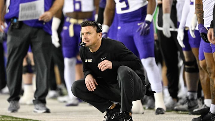 Dec 20, 2025; Eugene, OR, USA;  James Madison Dukes head coach Bob Chesney looks on during the first quarter against the Oregon Ducks at Autzen Stadium. Mandatory Credit: Troy Wayrynen-Imagn Images