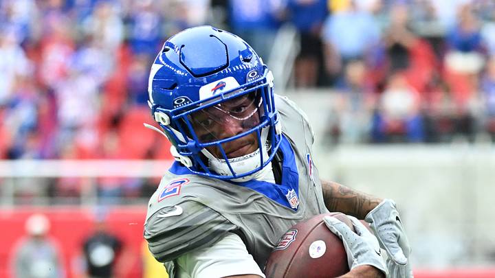 Sep 27, 2026; Orchard Park, New York, USA;  Buffalo Bills wide receiver DJ Moore (2) carries the ball in the second half against the Los Angeles Chargers at New Highmark Stadium.  Mandatory Credit: Mark Konezny-Imagn Images