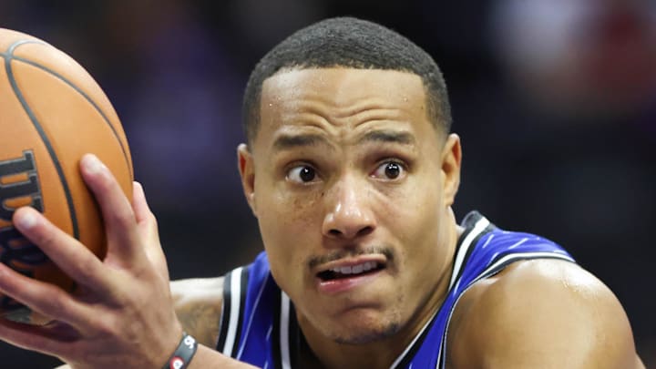 Orlando Magic guard Desmond Bane drives past Philadelphia 76ers forward Dominick Barlow. Orlando Magic guard Desmond Bane drives past Philadelphia 76ers forward Dominick Barlow.