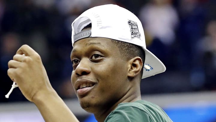Mar 31, 2019; Washington, DC, USA; Michigan State Spartans guard Cassius Winston (5) celebrates after beating the Duke Blue Devils in the championship game of the east regional of the 2019 NCAA Tournament at Capital One Arena.